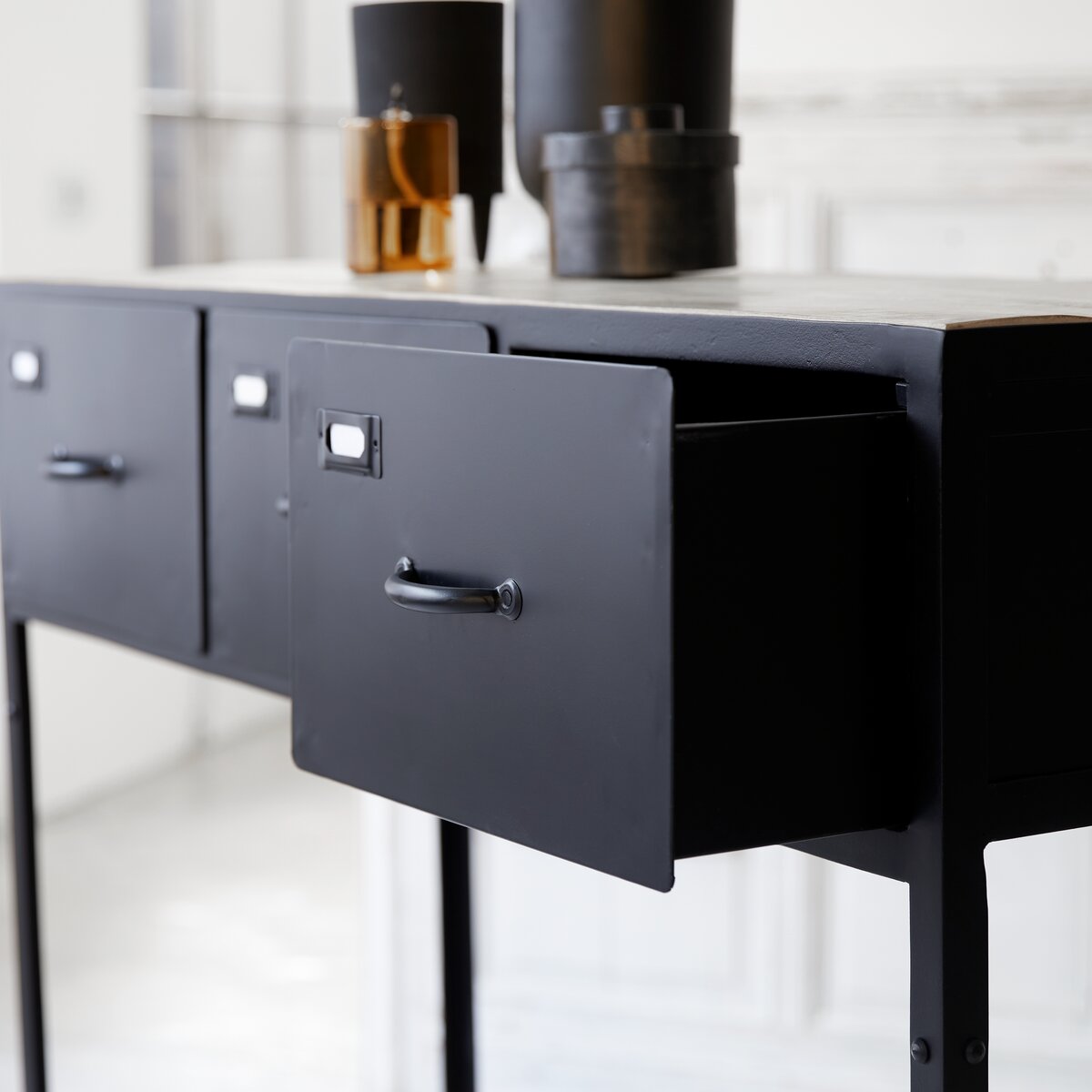 Black metal console table with deals drawers