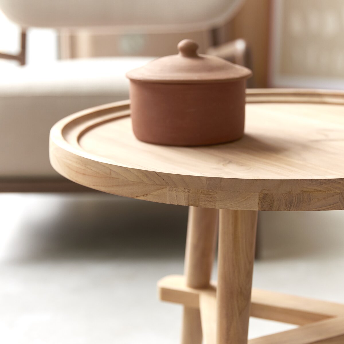 Round solid outlet side table