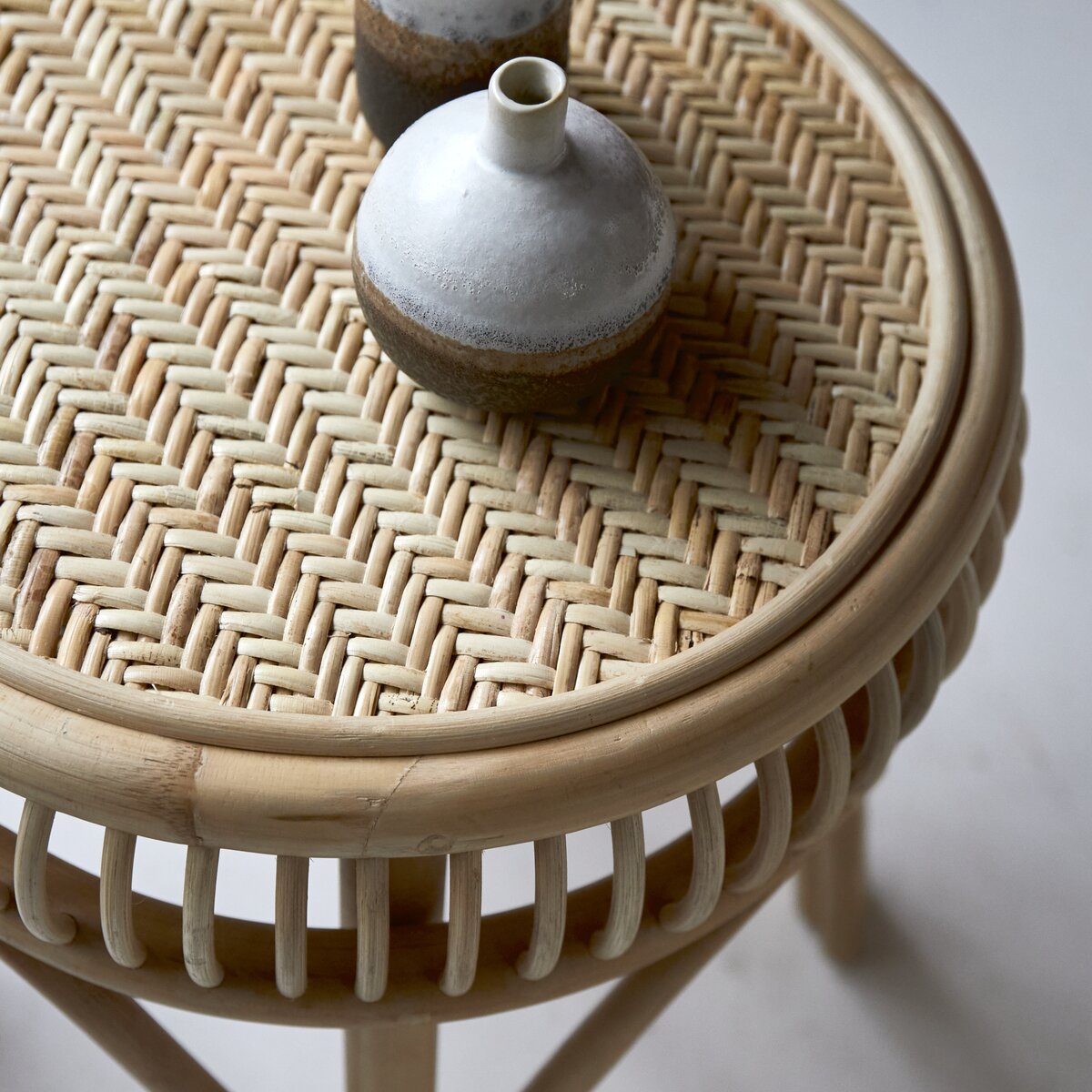 Round rattan store bedside table