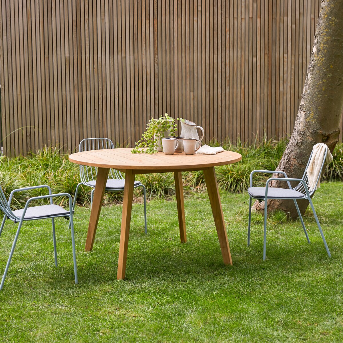 Table de jardin en teck recyclé ronde 6 personnes