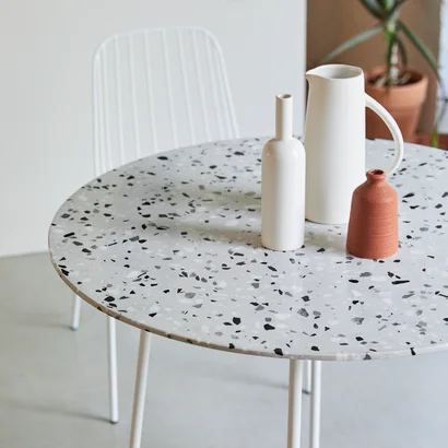 Elio - White round premium terrazzo and metal table