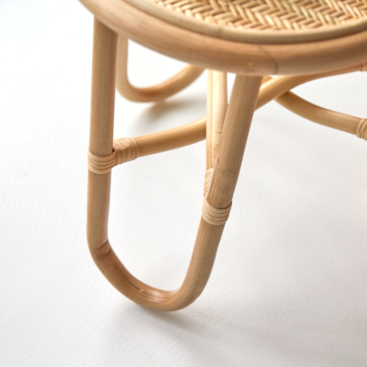 Round rattan store bedside table